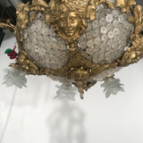 A Belle Epoque Eight Arm Chandelier Modelled with Dionysis/Bacchus Masks