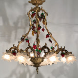 A Belle Epoque Eight Arm Chandelier Modelled with Dionysis/Bacchus Masks
