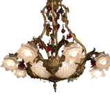 A Belle Epoque Eight Arm Chandelier Modelled with Dionysis/Bacchus Masks