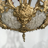 A Belle Epoque Eight Arm Chandelier Modelled with Dionysis/Bacchus Masks
