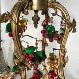 A Belle Epoque Eight Arm Chandelier Modelled with Dionysis/Bacchus Masks