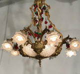 A Belle Epoque Eight Arm Chandelier Modelled with Dionysis/Bacchus Masks