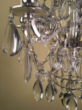 French Silvered Bronze and Cut Crystal Twelve-Light Chandelier