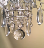 French Silvered Bronze and Cut Crystal Twelve-Light Chandelier