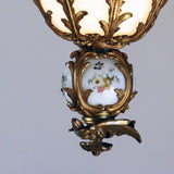 French Louis XV Style Rococo Bronze and Glass Eight-Light Chandelier