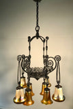 French Art Deco Iron Eight-Light Chandelier with Quezal Shades