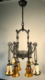 French Art Deco Iron Eight-Light Chandelier with Quezal Shades