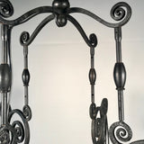 French Art Deco Iron Eight-Light Chandelier with Quezal Shades
