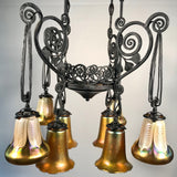 French Art Deco Iron Eight-Light Chandelier with Quezal Shades