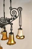French Art Deco Iron Eight-Light Chandelier with Quezal Shades