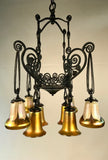 French Art Deco Iron Eight-Light Chandelier with Quezal Shades