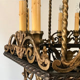 An Antique 12 Light Neo-Renaissance  Bronze and Wrought Iron Chandelier