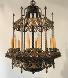 An Antique 12 Light Neo-Renaissance  Bronze and Wrought Iron Chandelier