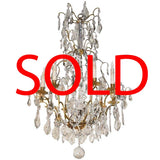 Louis XV Style Gilt Bronze and Crystal Eight-Light Chandelier