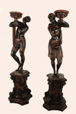 Pair of Ebonized Blackamoors on Pedestals