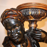 Pair of Ebonized Blackamoors on Pedestals
