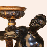 Pair of Ebonized Blackamoors on Pedestals