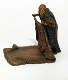 Good Bergman Bronze of a Arab Carpet Dealer Showing His Wares