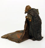 Good Bergman Bronze of a Arab Carpet Dealer Showing His Wares