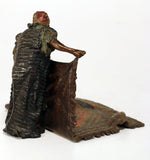 Good Bergman Bronze of a Arab Carpet Dealer Showing His Wares