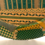 Collage Charger by Gloria Vanderbilt