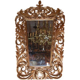 Italian giltwood  Baroque mirror in boldly carved frame