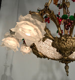 A Belle Epoque Eight Arm Chandelier Modelled with Dionysis/Bacchus Masks