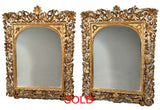 Near Pair of  Florentine Baroque Giltwood Mirrors