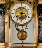 French Empire Style Gilt bronze and Green Marble Mantel Clock