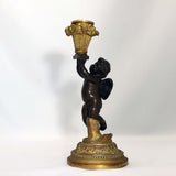 Pair of French Louis XV Style Candlesticks, Modelled as Cherubs with Baskets