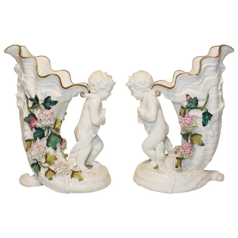 Pair of Cherub and Cornucopia Vases